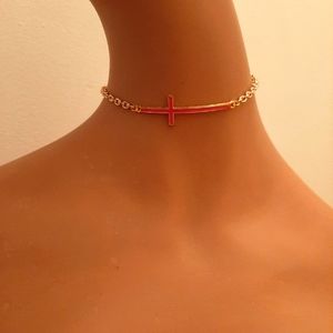 Pink Cross on Gold Chain Necklace.